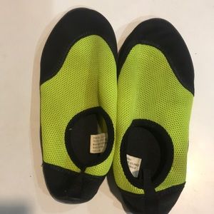 Lime green and black swim shoes